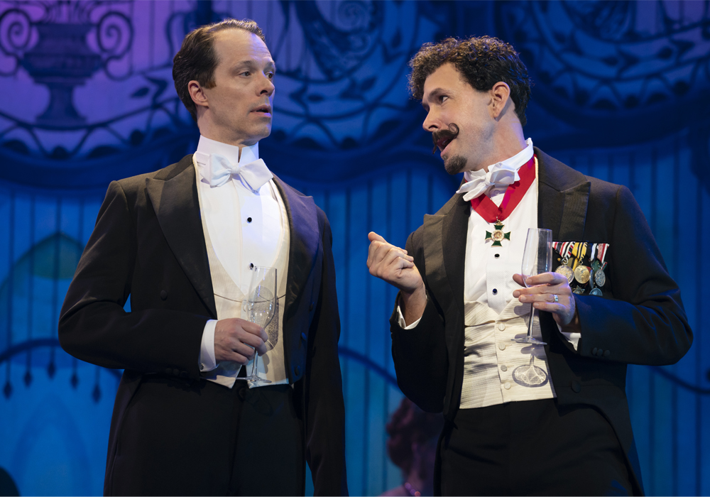 Laird Mackintosh as Professor Henry Higgins and Wade McCollum as Professor Zoltan Karpathy in The Lincoln Center Theater Production of Lerner & Loewe’s My Fair Lady