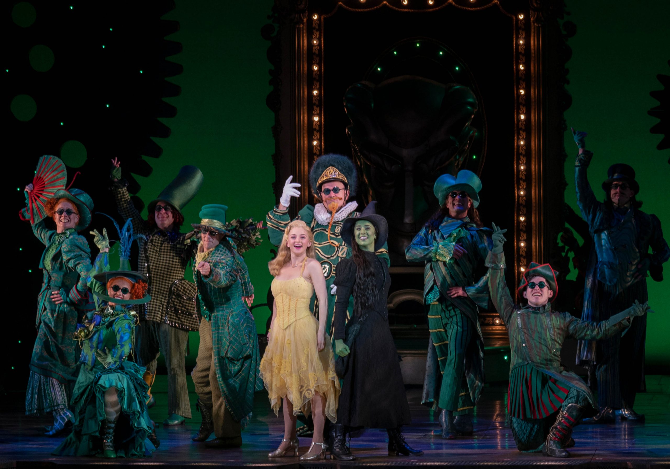 Production image from Wicked, Glinda and Elphaba in the Emerald City