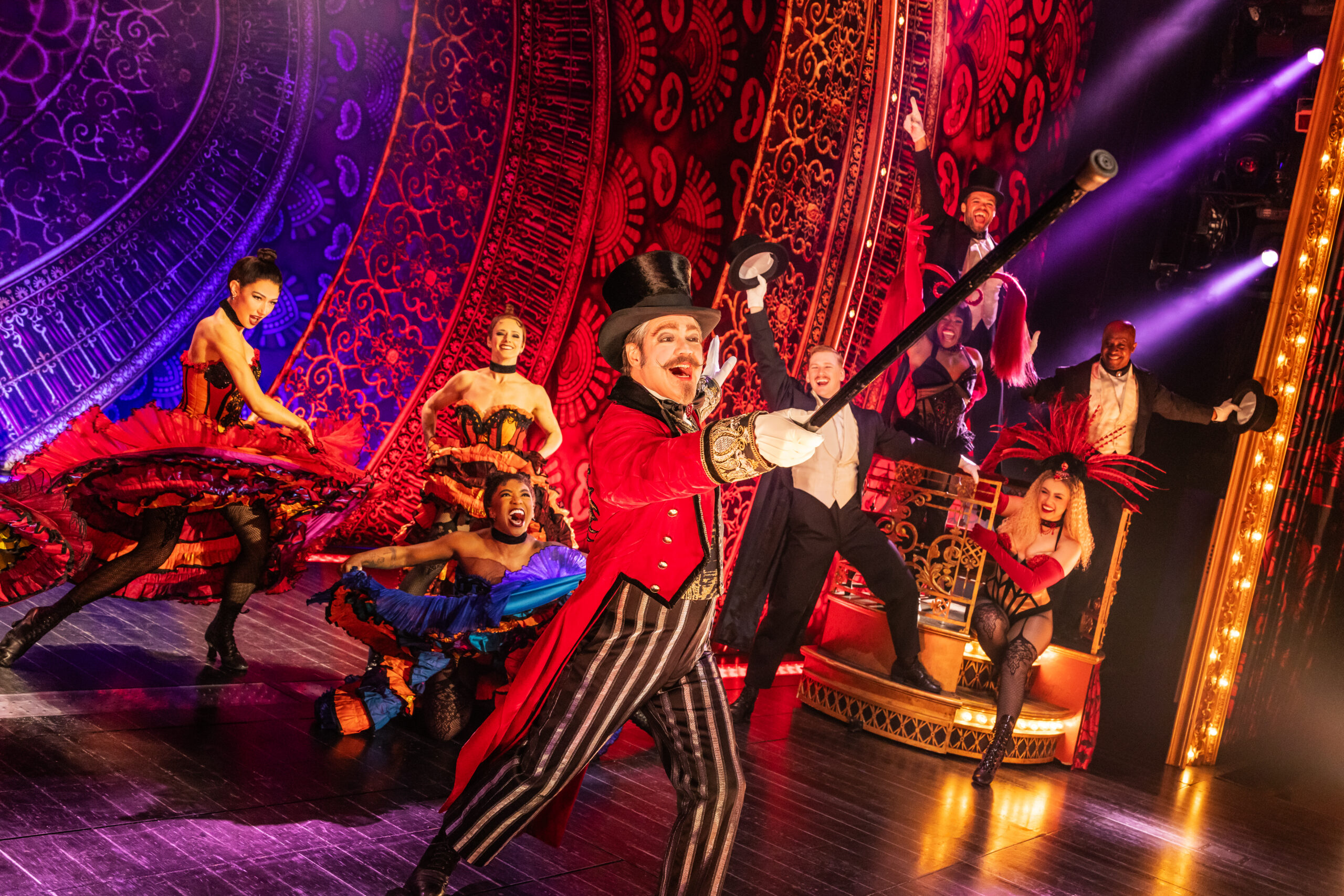Robert Petkoff and the Company of the 2025 touring production of MOULIN ROUGE! THE MUSICAL